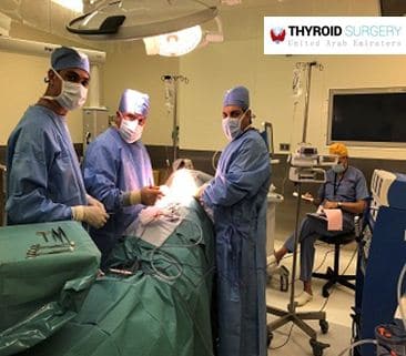 Team Of Doctors Performing Thyroid Surgery