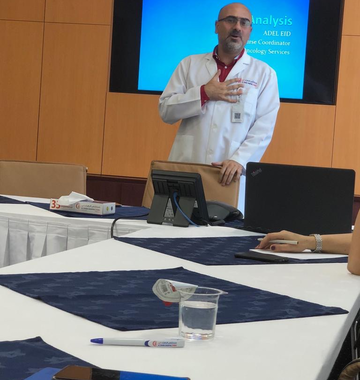Adel Eid During An Educational Nursing Lecture For Oncology Nurses